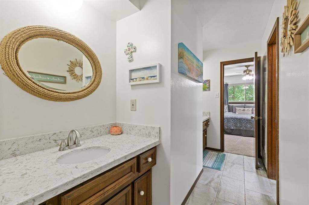 Both upstairs bathrooms have double sinks.