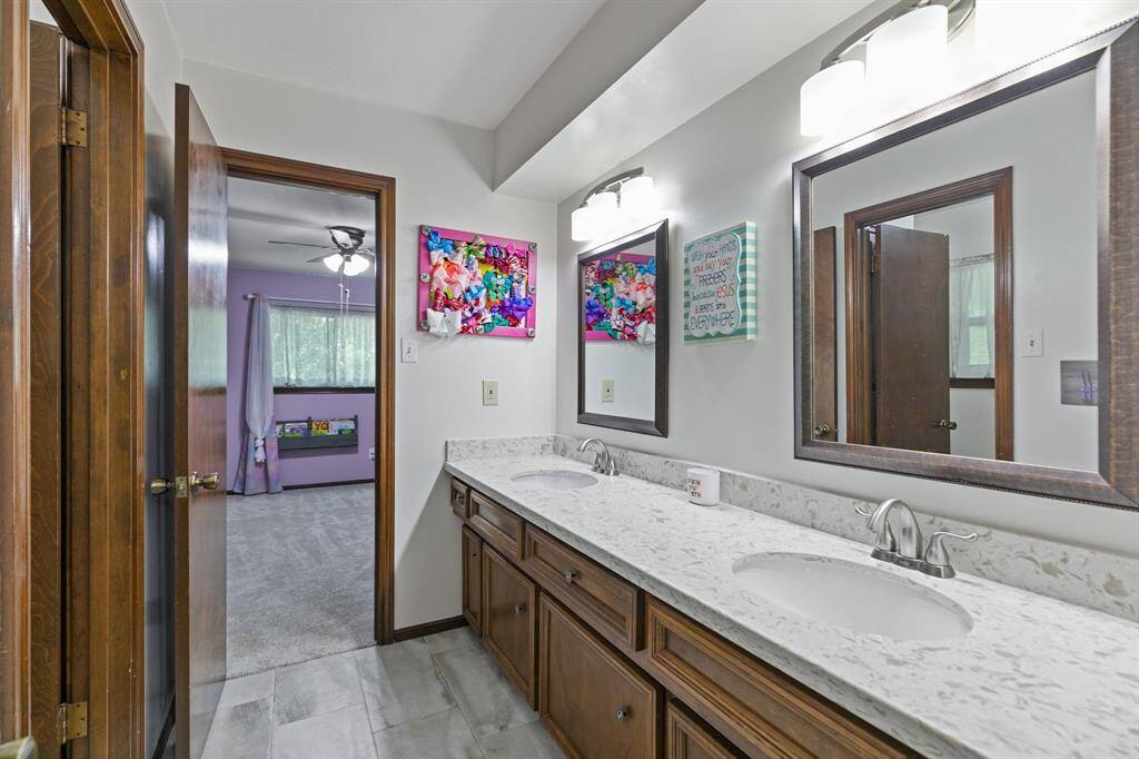 Both upstairs bathrooms have updated vanity fixtures.