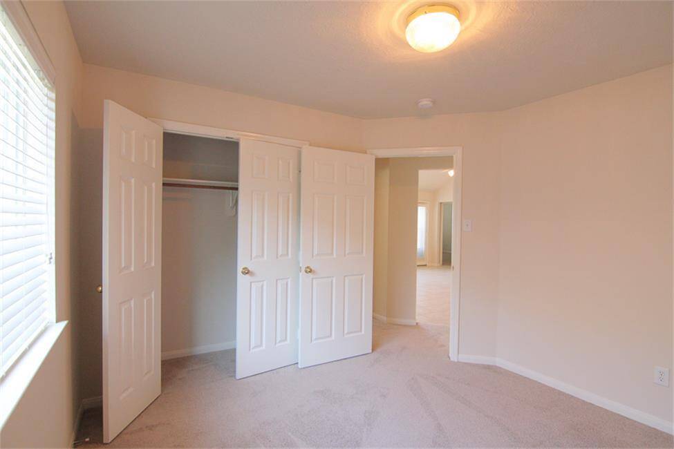 bedroom 2 of 4 (reverse angle)