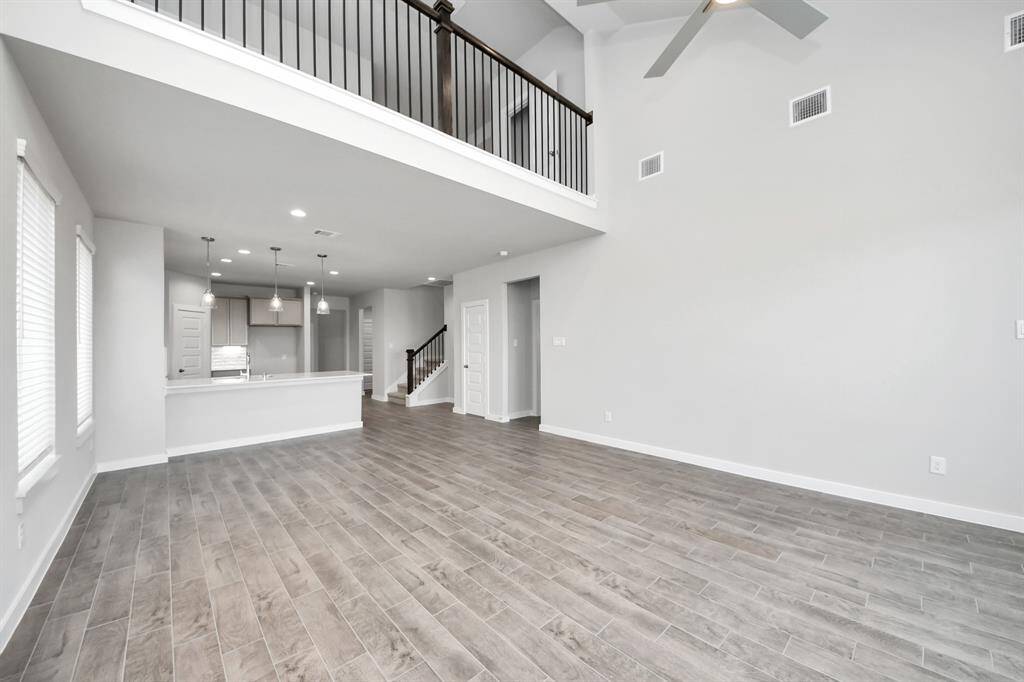 Sample photo of completed home with similar floor plan. As built color and selections may vary.