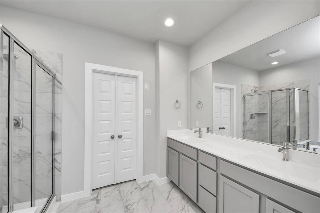Sample photo of completed home with similar floor plan. As built color and selections may vary.