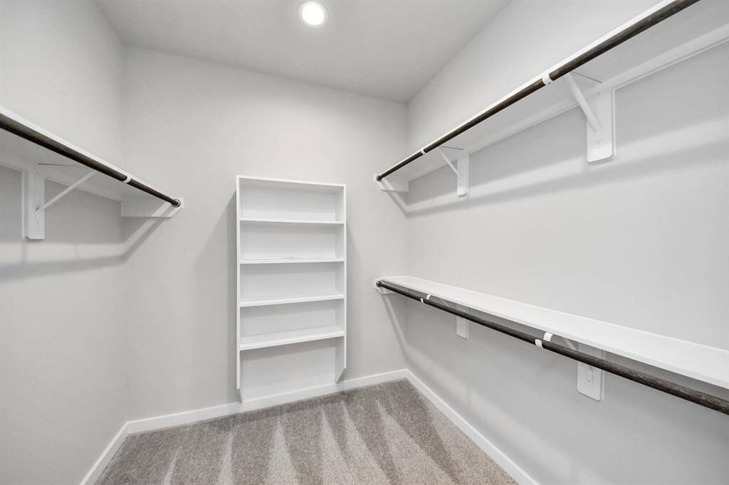 Sample photo of completed home with similar floor plan. As built color and selections may vary.