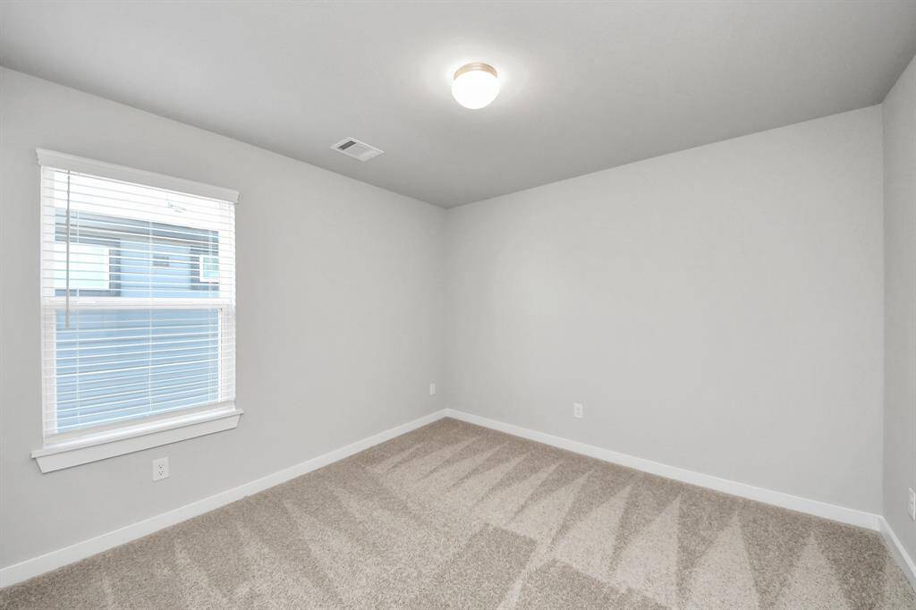 Sample photo of completed home with similar floor plan. As built color and selections may vary.