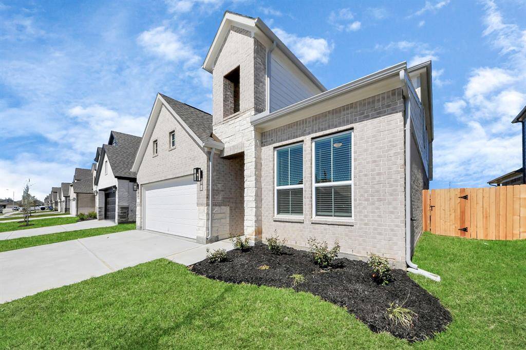 Sample photo of completed home with similar floor plan. As built color and selections may vary.