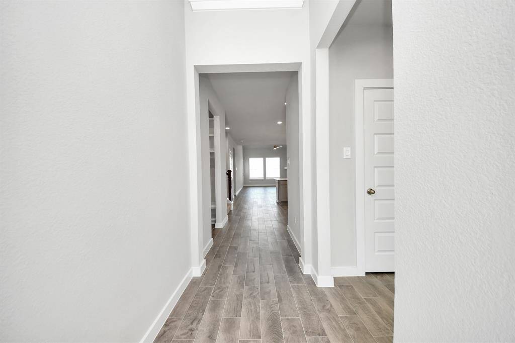 Sample photo of completed home with similar floor plan. As built color and selections may vary.