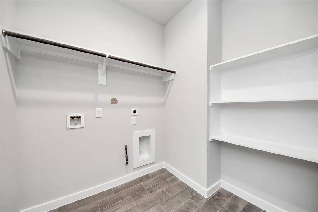 Sample photo of completed home with similar floor plan. As built color and selections may vary.