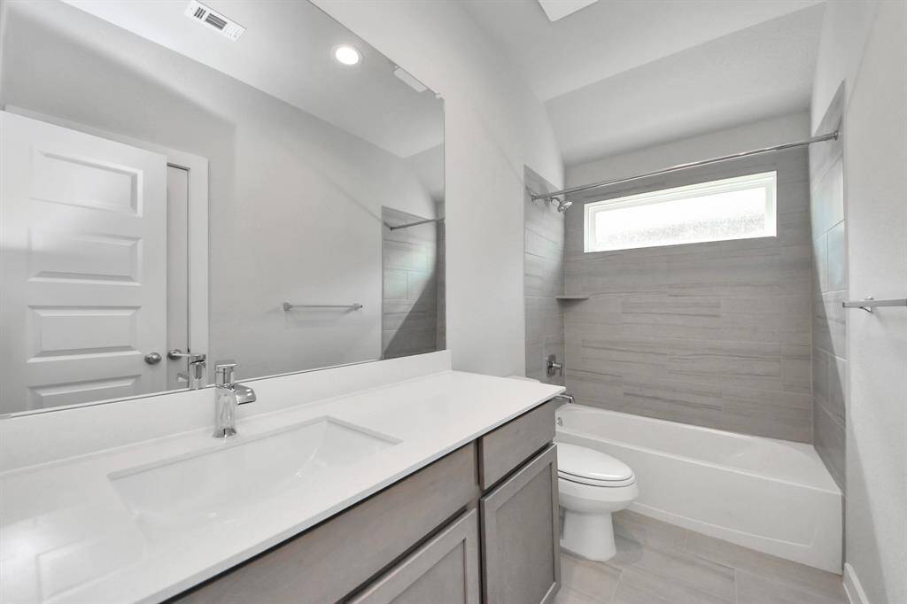 Sample photo of completed home with similar floor plan. Actual colors and selections may vary.