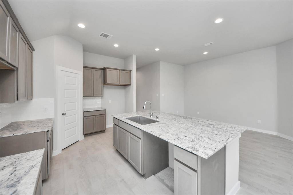 Sample photo of completed home with similar floor plan. Actual colors and selections may vary.