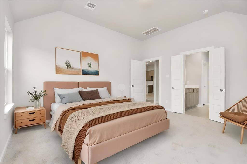 *Virtually Staged* Primary Bedroom. Sample photo of completed home with similar floor plan. Actual colors and selections may vary.