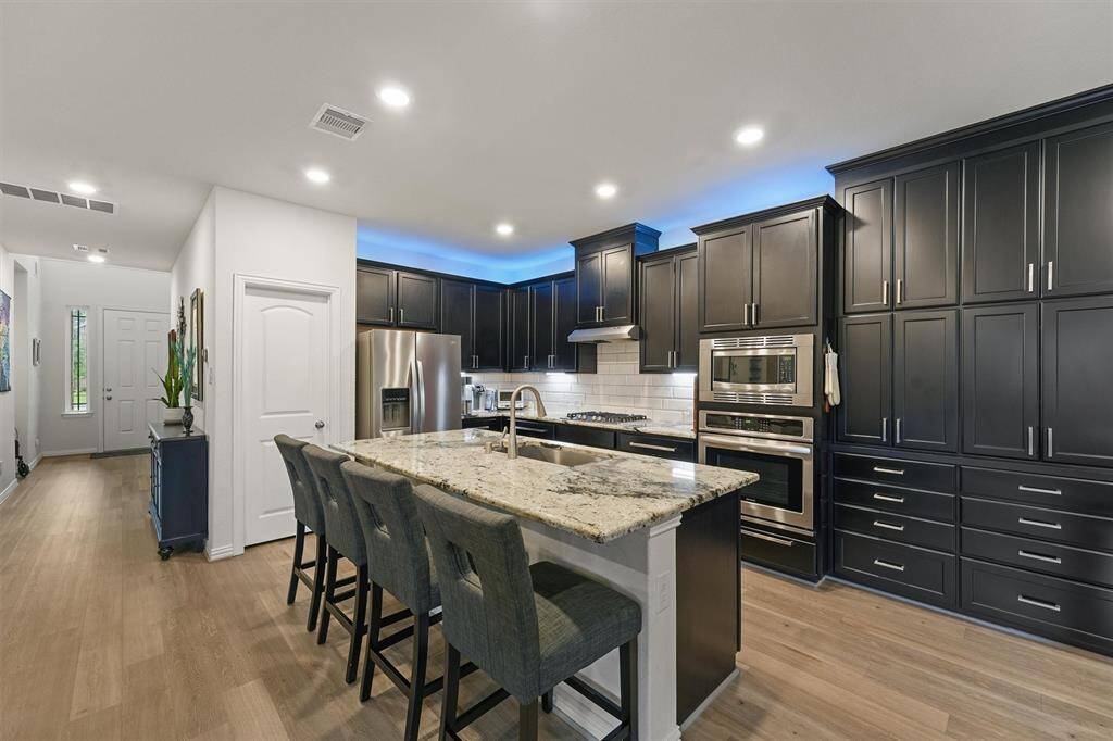 Kitchen with custom slide-out shelving