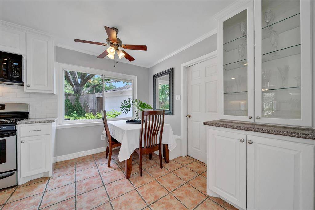 Beautiful breakfast nook with additional cabinetry.