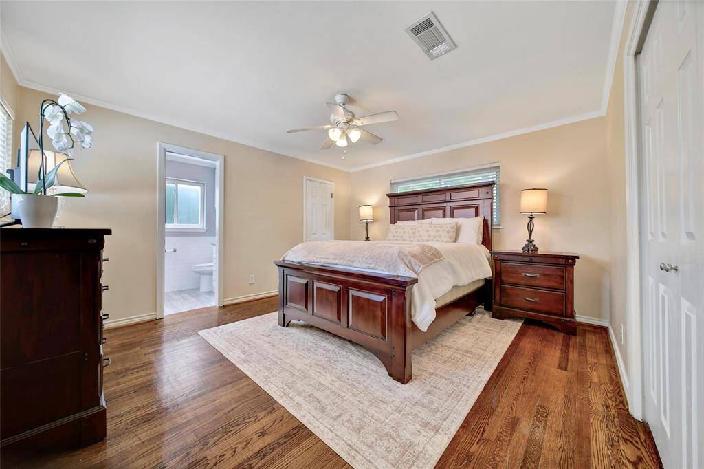 Primary bedroom with double closets and ensuite bathroom.