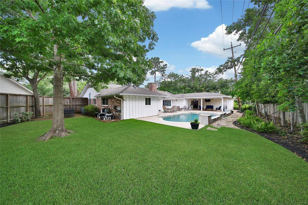 Expansive backyard with room to relax, play, or entertain.