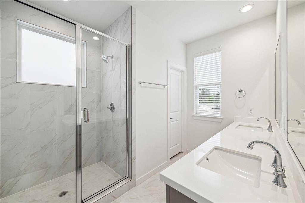 Primary bathroom with jack and jill sinks