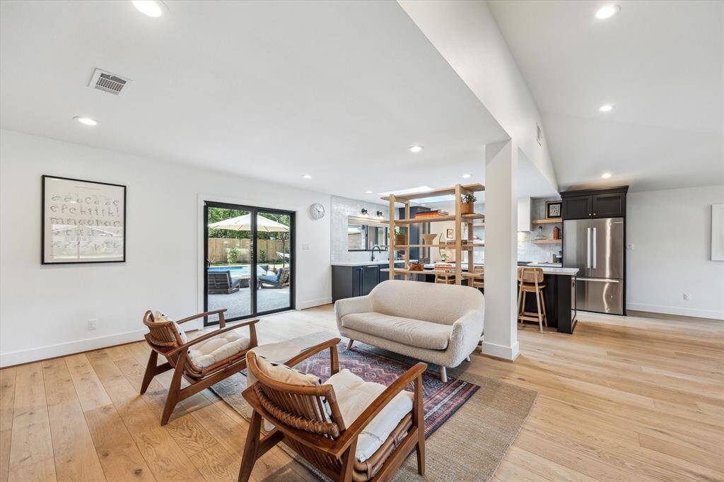The family room is open to the living room and kitchen- ideal for everyday living and entertaining.