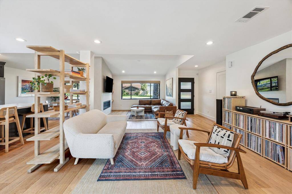 The home features Anderson Windows and 8-foot white oak engineered hardwood floors.