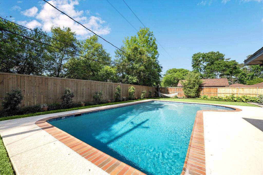 In *2021 the pool was resurfaced by StoneScapes with a custom glass & quartz blend, the waterline tile was replaced, the plumbing underneath the pool was replaced and plumbing was added for a future water feature. *per seller