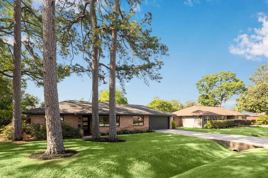 Located on a large 10,000+ sf lot within walking distance to Candelight Park and zoned to Oak Forest Elementary, this one checks all of the boxes!