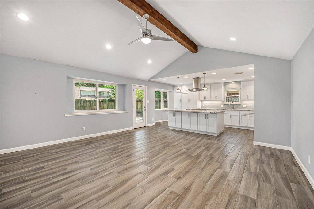 Family room is spacious enough for all your daily living. Anderson double paned windows throughout the home. Open concept to the modern kitchen with access to the back patio and yard.