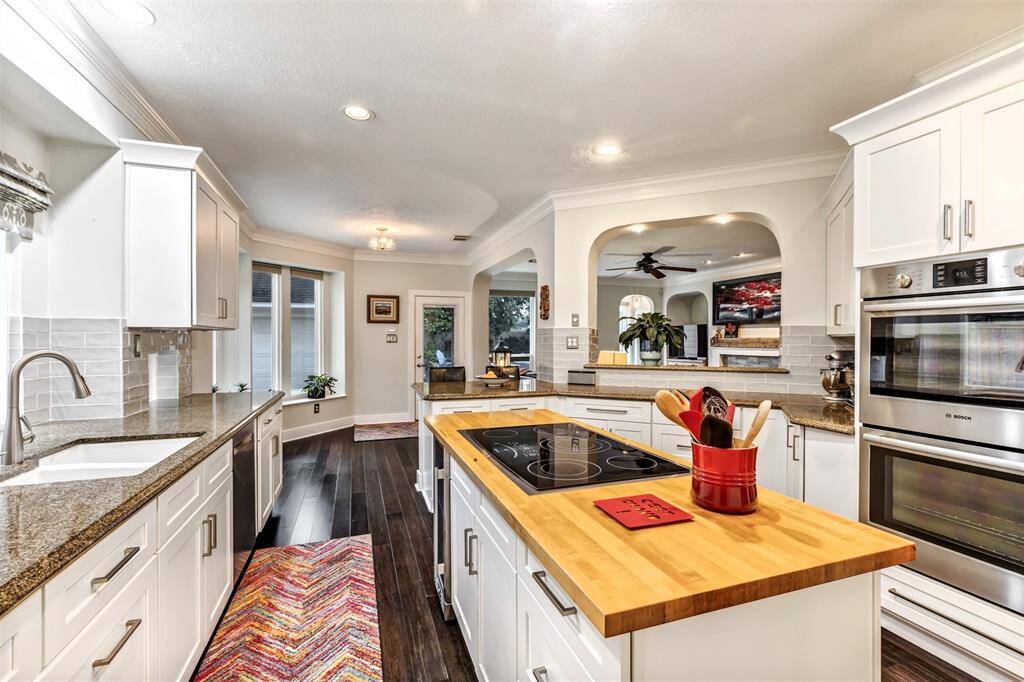 Natural light fills the space thanks to big windows in the kitchen and breakfast room, and there’s no shortage of storage or prep space. Bamboo flooring and crown molding add just the right finishing touches.