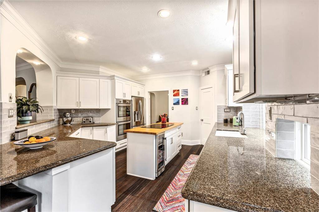 From the high ceilings to the private sitting area with its own fireplace, this primary suite has all the right features to create a quiet, relaxing space you’ll look forward to coming home to.