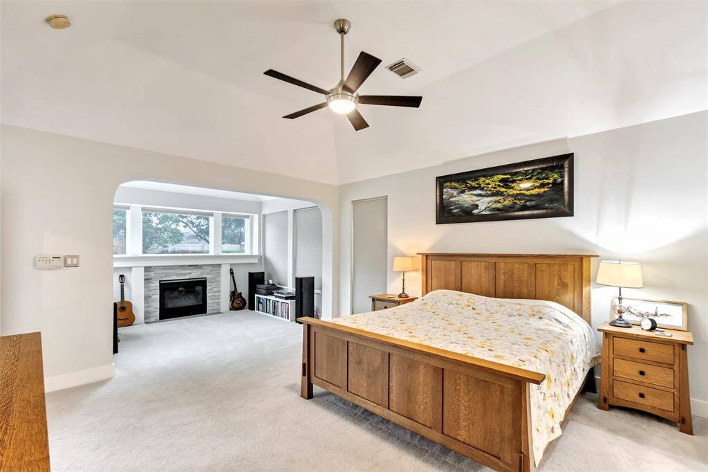 The spacious walk-in shower is a standout feature, with room to move and a clean, classic look. It sits right across from the jetted tub, so you can choose your kind of relaxation.