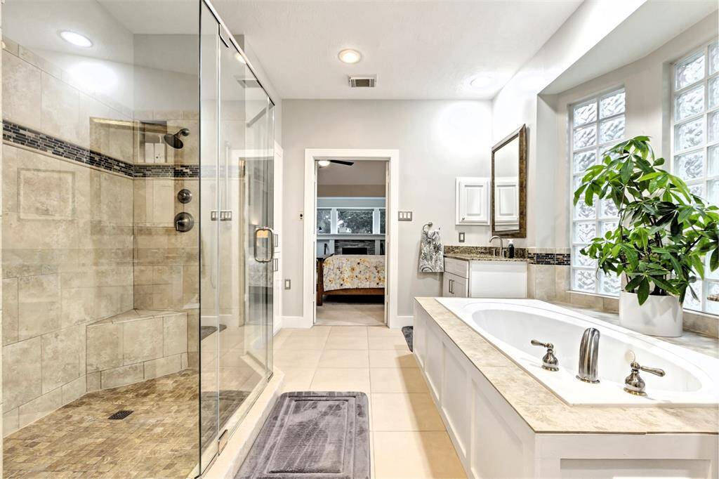 Even the half bath makes a statement with its unique tile accent wall and upscale finishes.