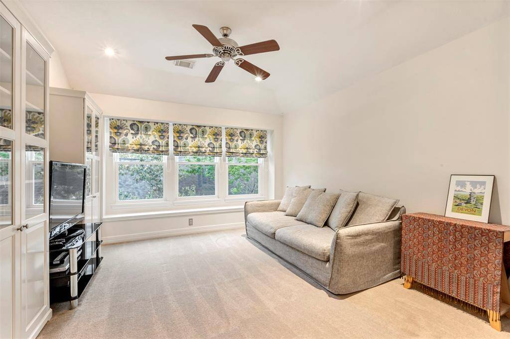 Secondary bedroom no. 1. All secondary bedrooms are generously sized and located on the second floor.