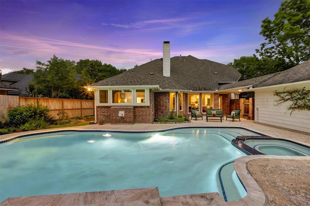 Another moment to appreciate the backyard retreat. Picture yourself kicking back and relaxing while the family splashes around!