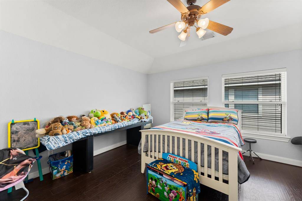 Large private game room currently being used as bedroom