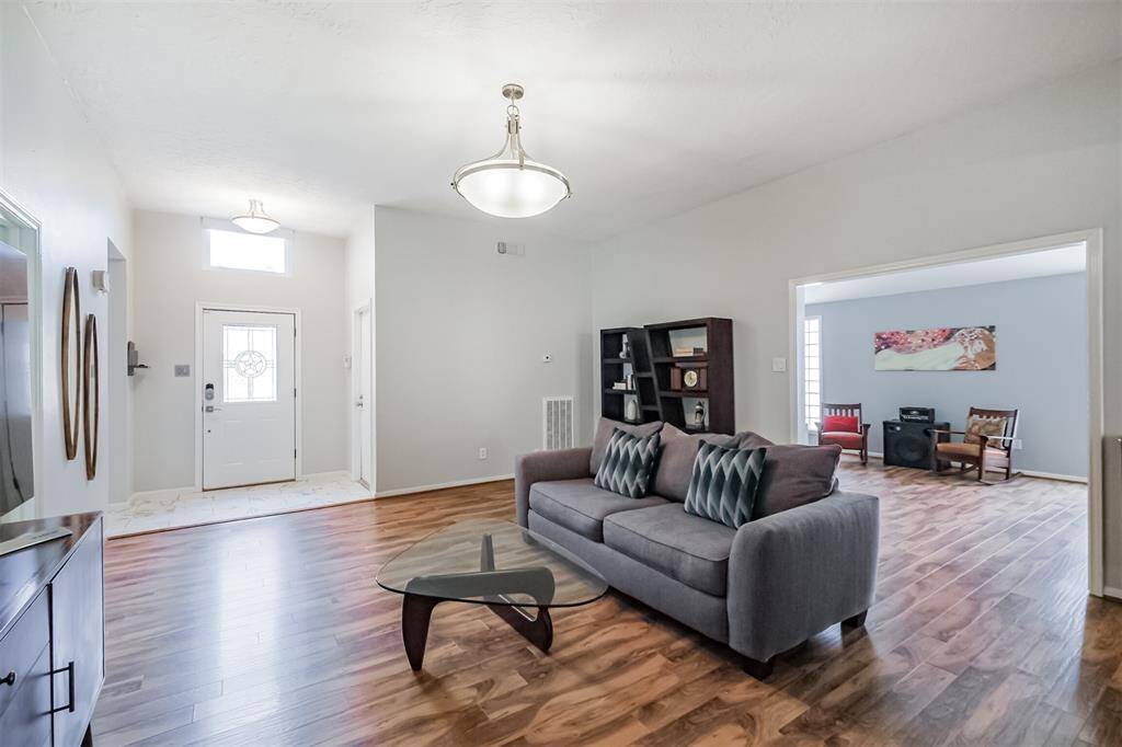 From this viewpoint you can see the front door entry and extra room off to the right side.