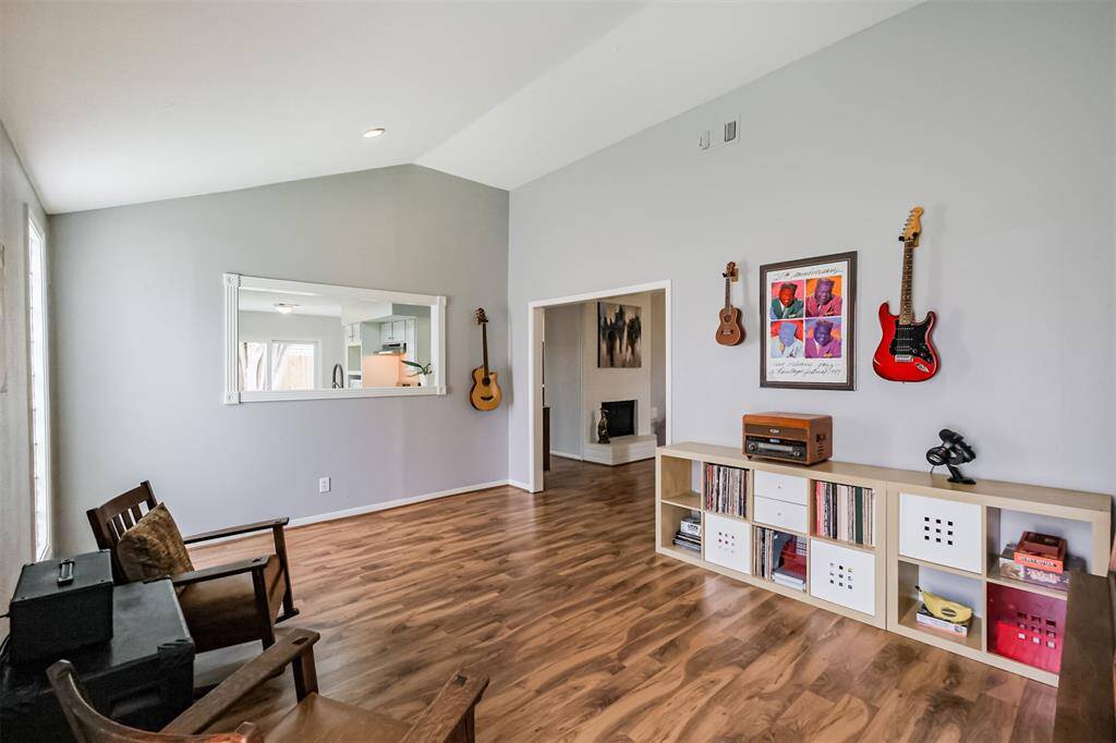 From this angle you can see the kitchen is open to the extra room and living area.