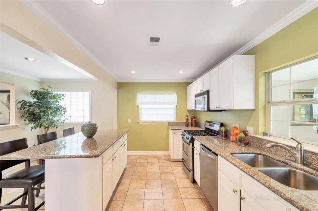 Granite counter tops throughout kitchen
