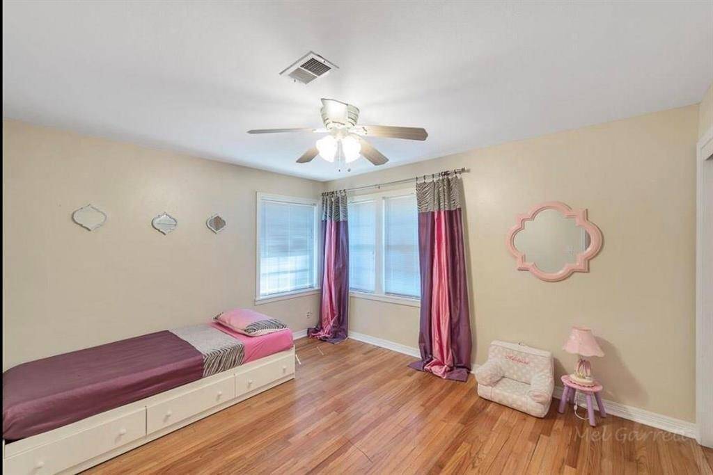 Bedroom 2 with hardwood floors