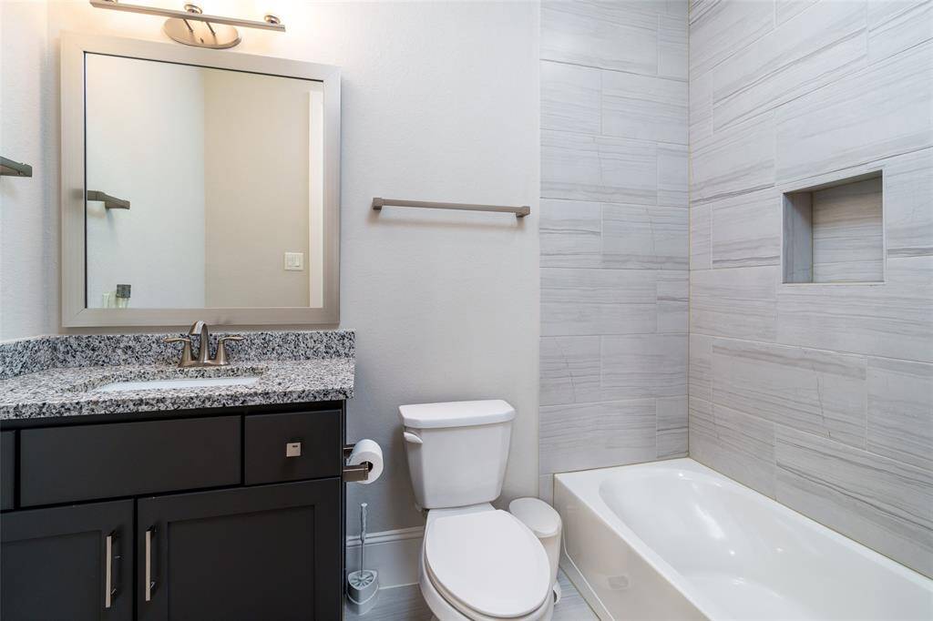 Relax in this Elegant en-suite bathroom with sleek modern finishes