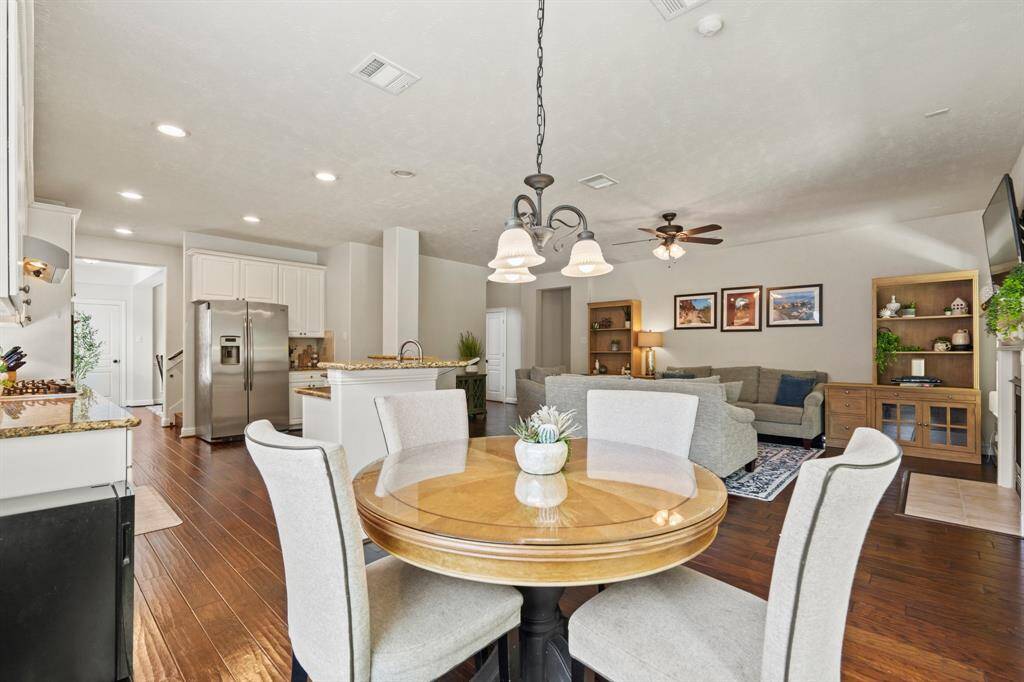 Another look at the breakfast area shows off the open-concept layout—bright, airy, and perfect for everyday living.