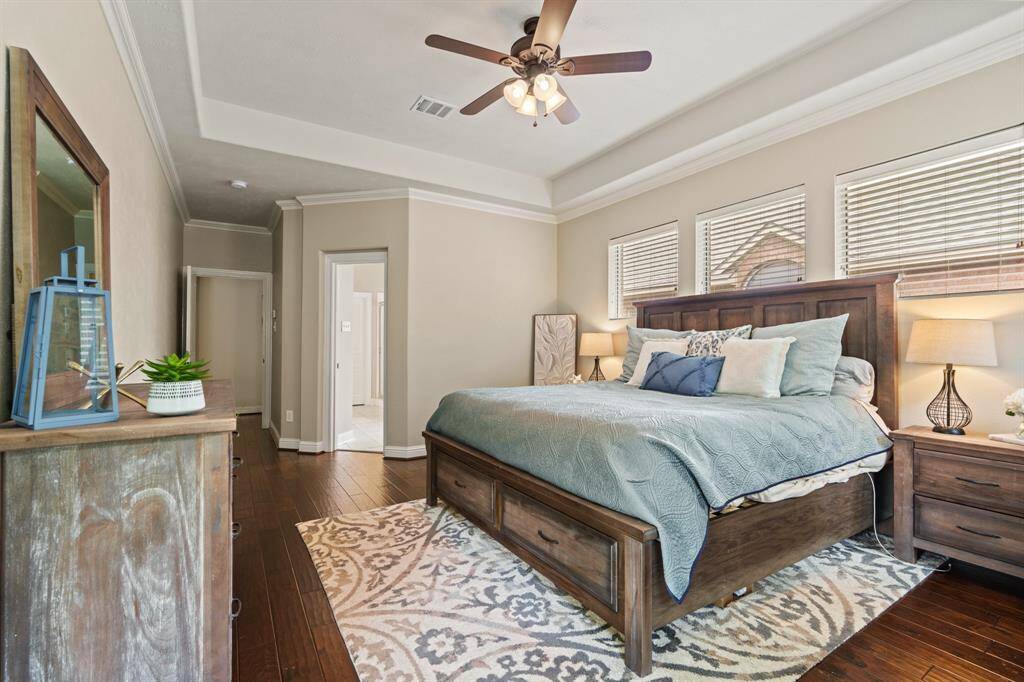 This elegant owner’s retreat offers the perfect space to unwind at the end of the day—peaceful and private.