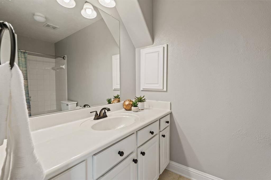 Guests and family alike will feel spoiled in this generously sized ensuite with modern finishes.