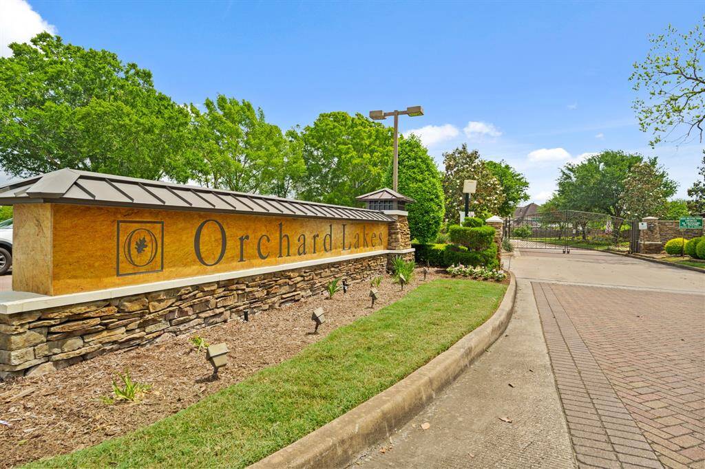Orchard Lake Estates is a gated enclave of around 500 homes—peaceful, private, and picture-perfect.