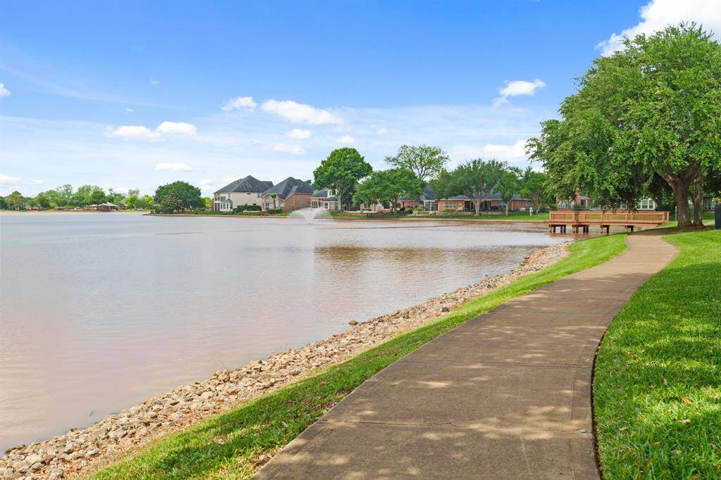Taken along the walking trail near the home—this photo captures the neighborhood’s tranquil, natural beauty.