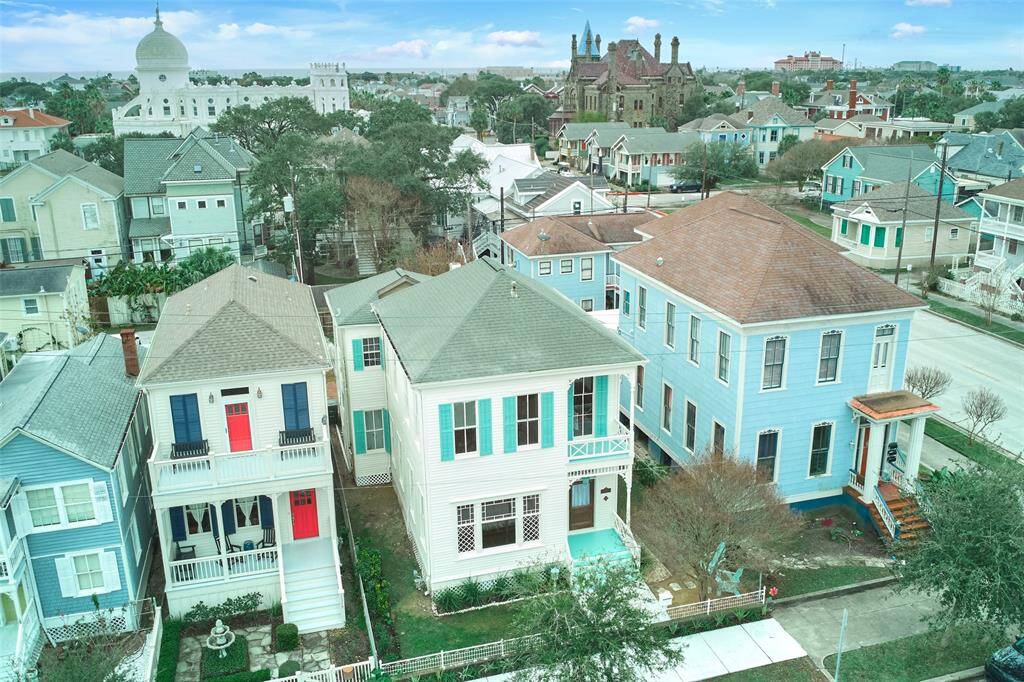 Explore this charming home featuring a historic "Mather" concrete plaque, original wrought iron fence, and a stunning gas lantern. Enjoy the fresh curb appeal including a new concrete sidewalk and walkway.