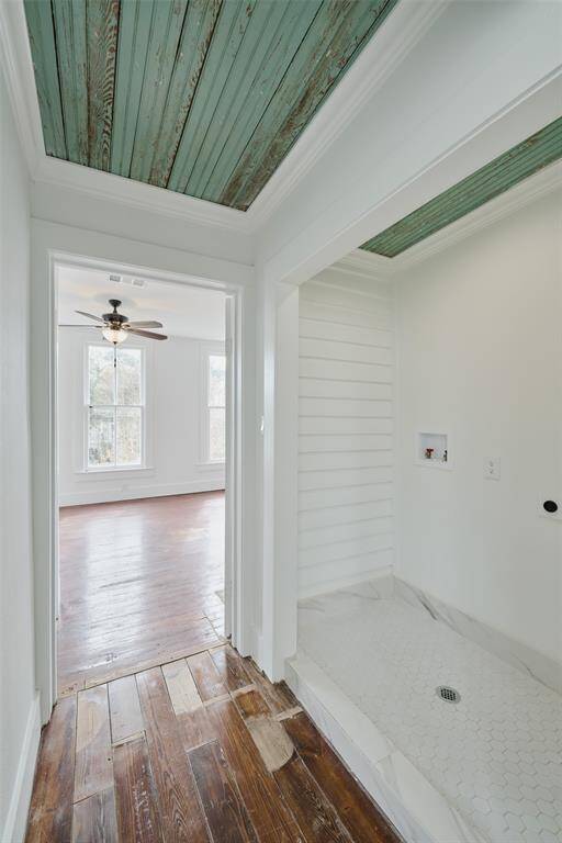 Discover this beautifully renovated historic gem, built circa 1894, in the coveted East End district. A proud survivor of the 1900 storm, this home blends timeless charm with modern elegance.