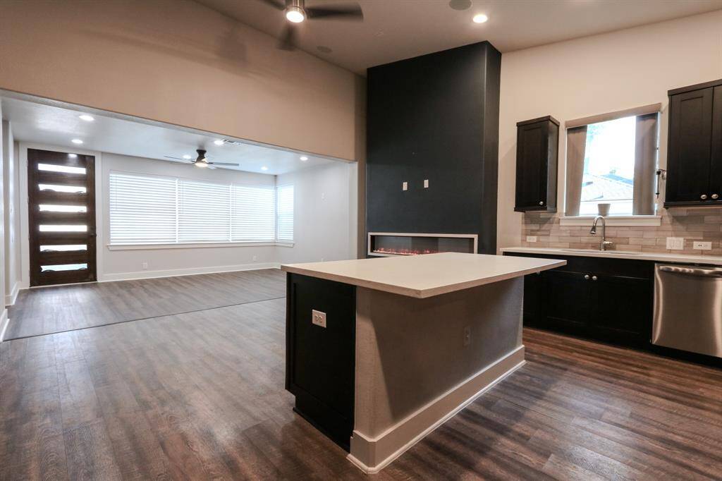 Entering the foyer, enjoy the spacious newly updated living area with large windows.
