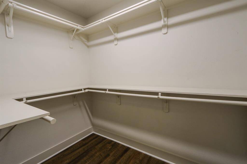 Custom walk-in closet at the primary bedroom.