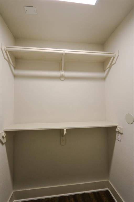 Walk-in closet with washer & dryer connection.