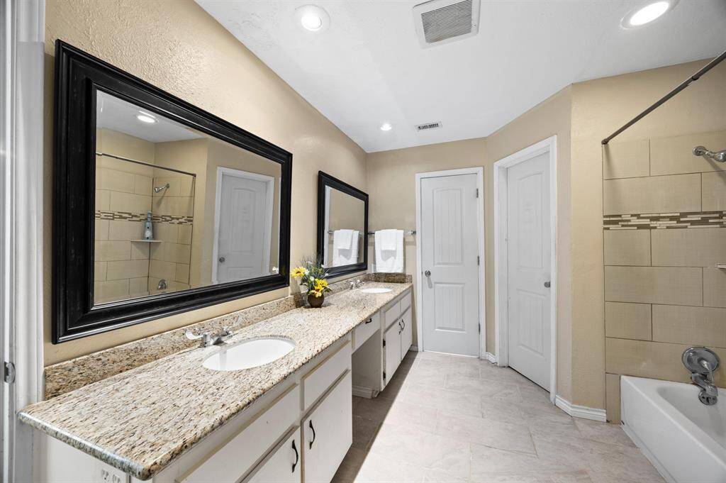 Beautiful Primary Bathroom with double sinks and vanity.