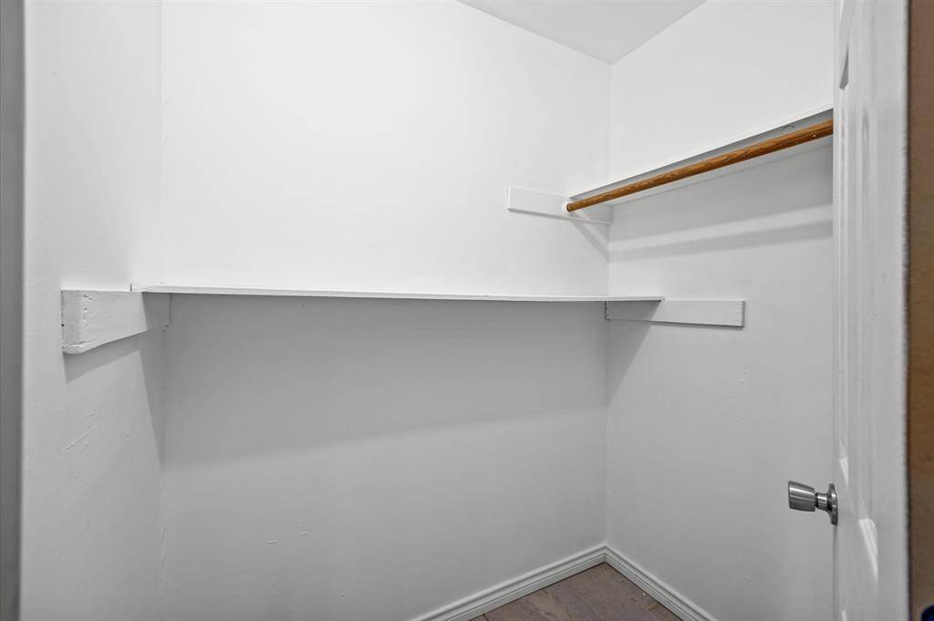1 of 2 primary separate closets spaces.