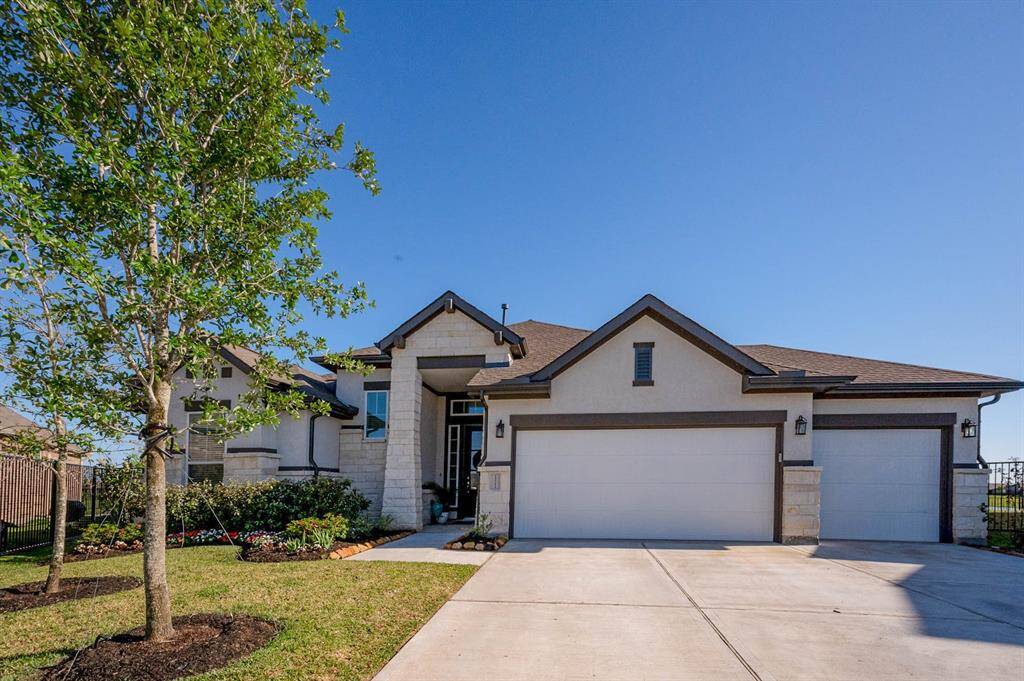 Enjoy stunning panoramic water views and serene birdwatching from the expansive rear windows or covered patio.