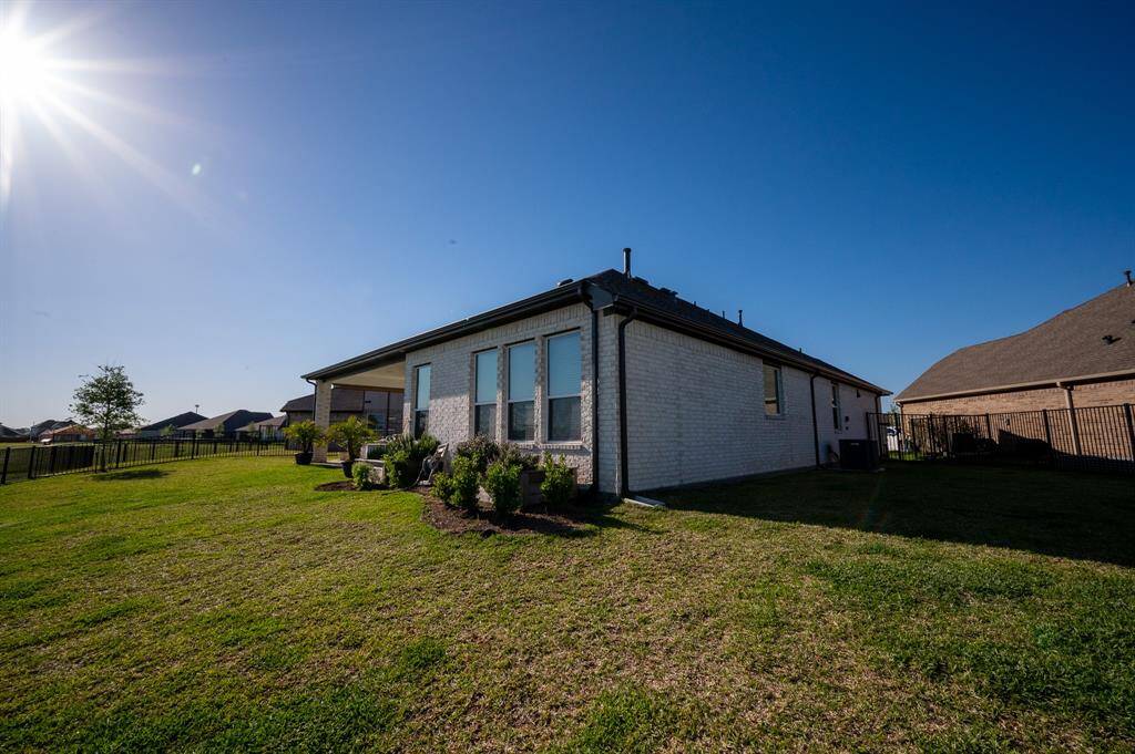 Spacious backyard ideal for summer gatherings.