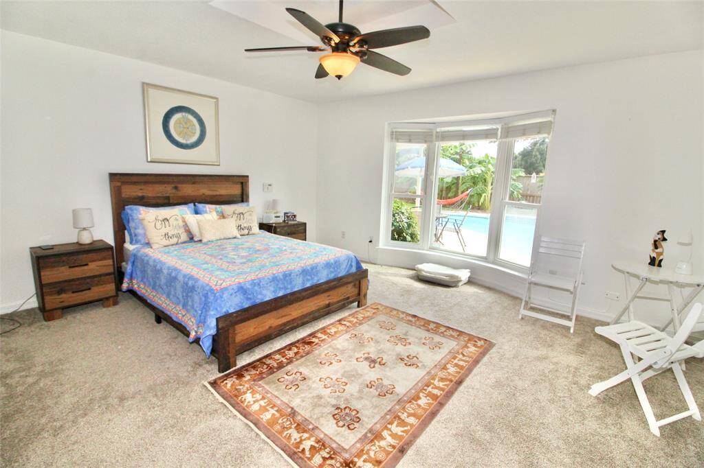 Large primary bedroom over looking the back yard